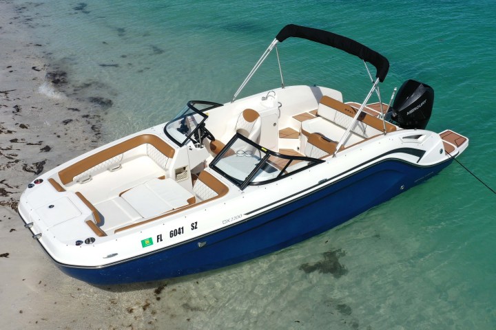 a boat sitting next to a body of water